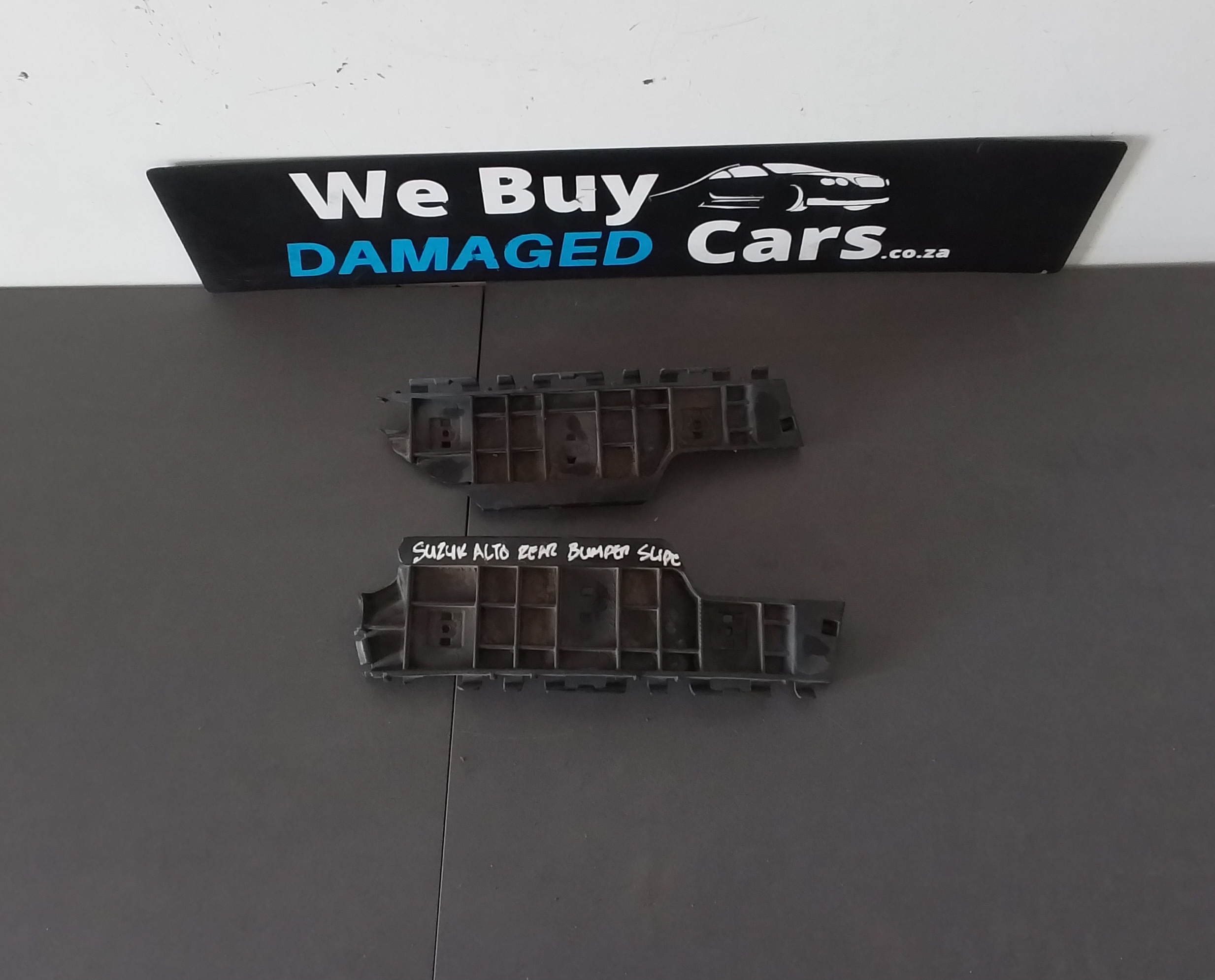 Suzuki Alto R06A Rear Bumper Slide OEM